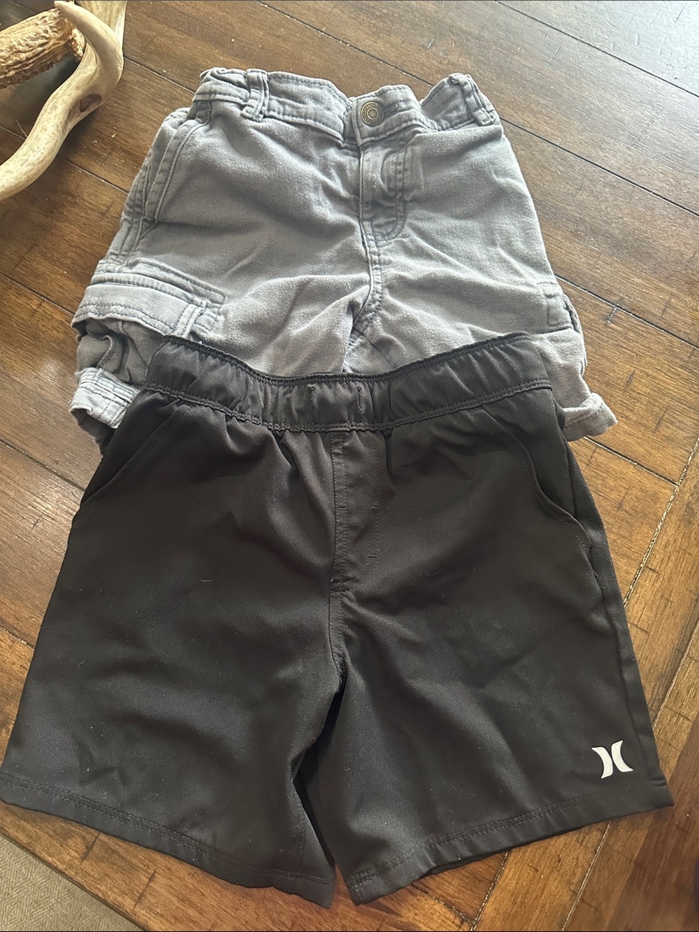 Hurley Kids Black Athletic Shorts and grey cargo shorts